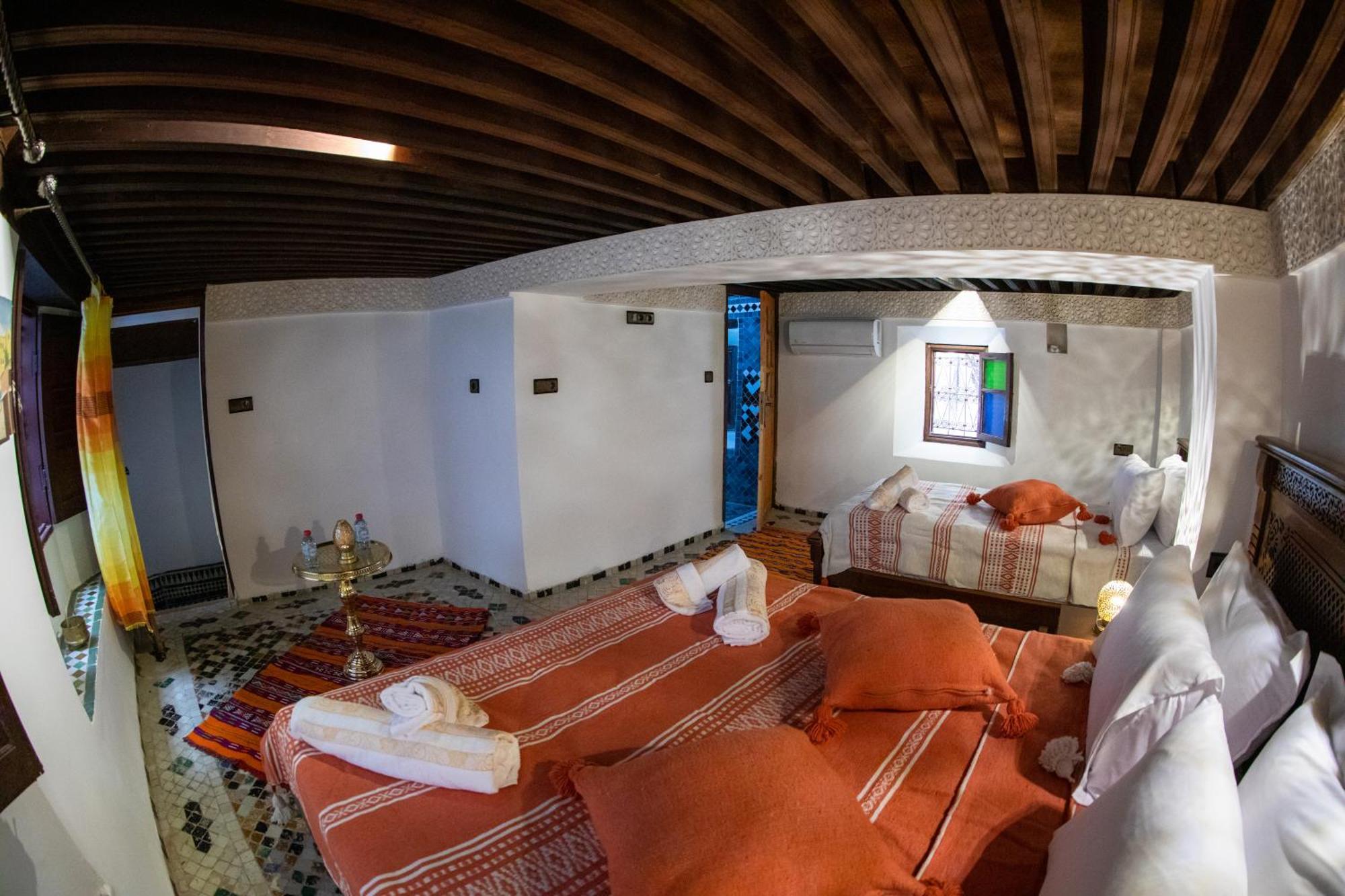 Taj Fez